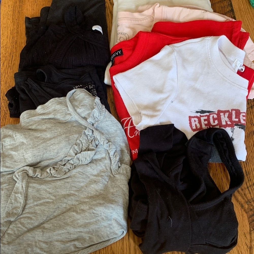 Lot of 9 small tank tops and t shirts various brands 
See pics